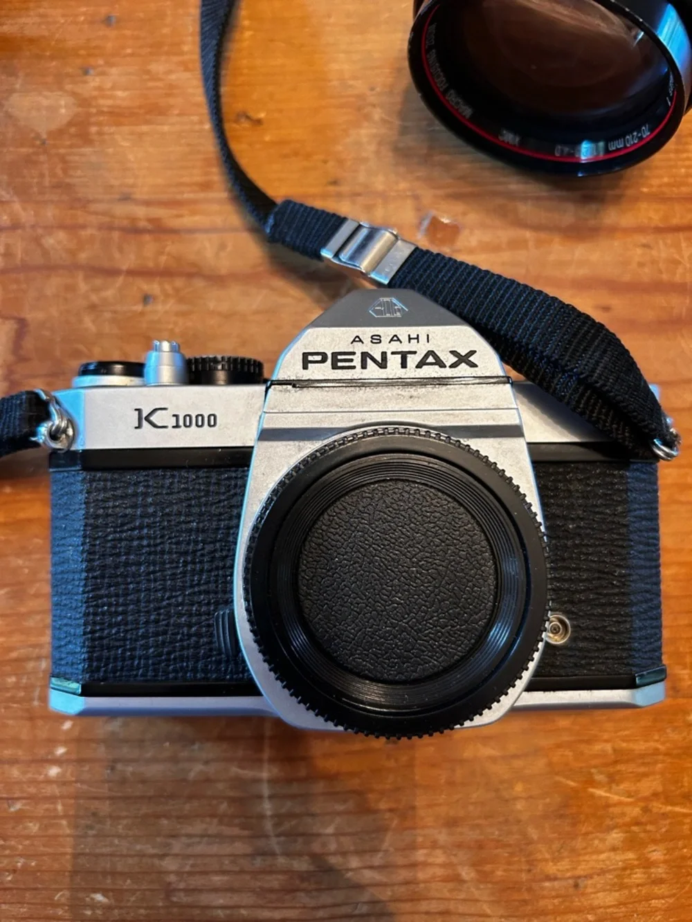 Asahi PENTAX K1000 SLR 35mm camera and Vivitar Series 1 macro-focusing zoom.
